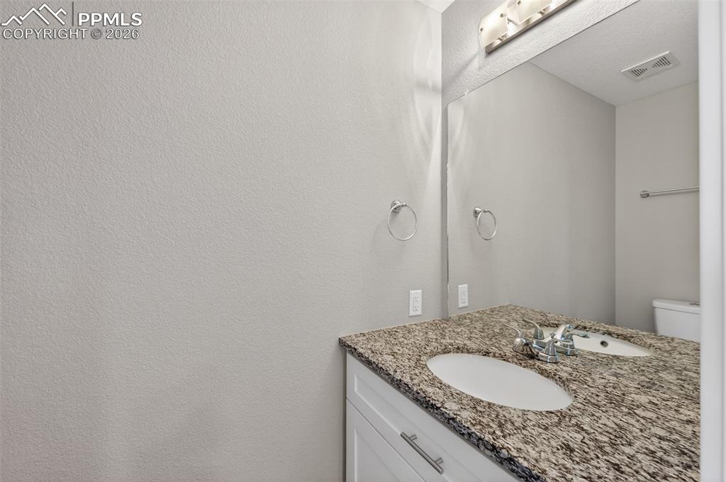 Image 15 of 46: Powder Bathroom