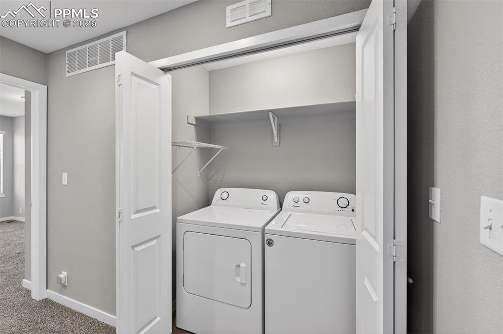 Image 30 of 46: Upstairs laundry