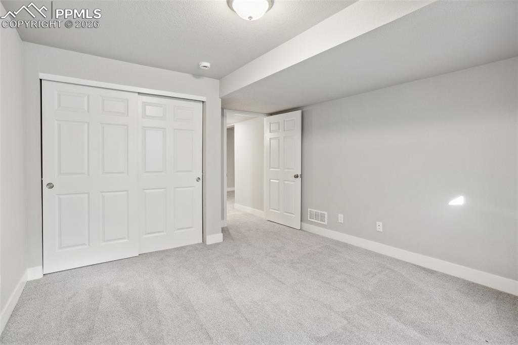 Image 22 of 37: Bedroom