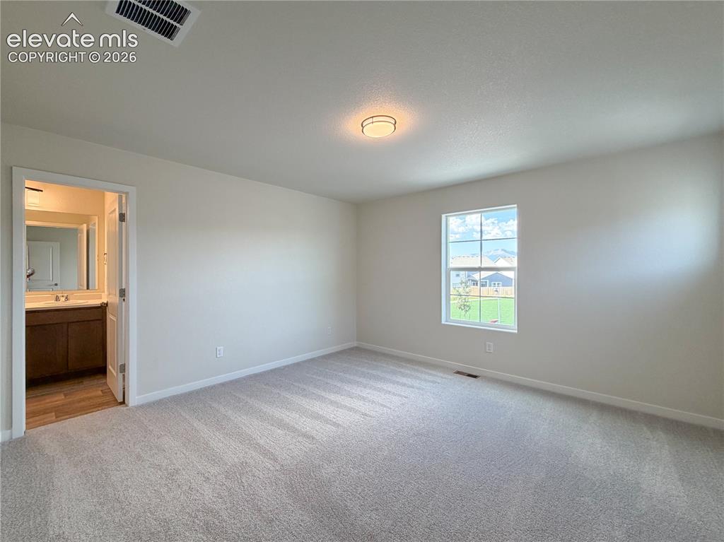 Image 11 of 32: Master Bedroom