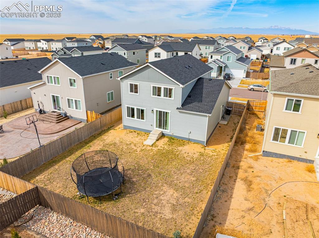Image 38 of 40: Aerial view of residential area and beautiful mountains!!