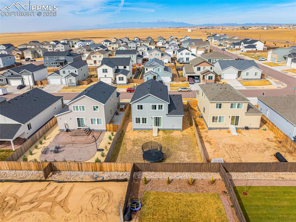 Image 39 of 40: Aerial view of residential area and beautiful mountains!!