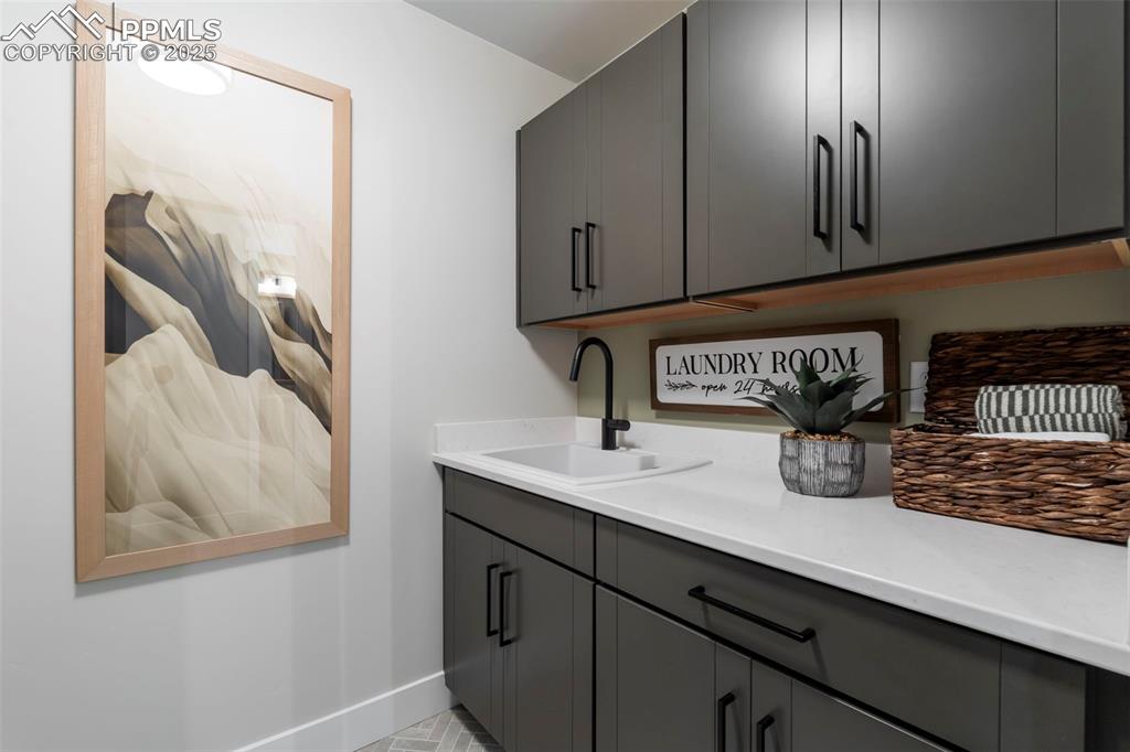 Image 34 of 50: Basement laundry room.