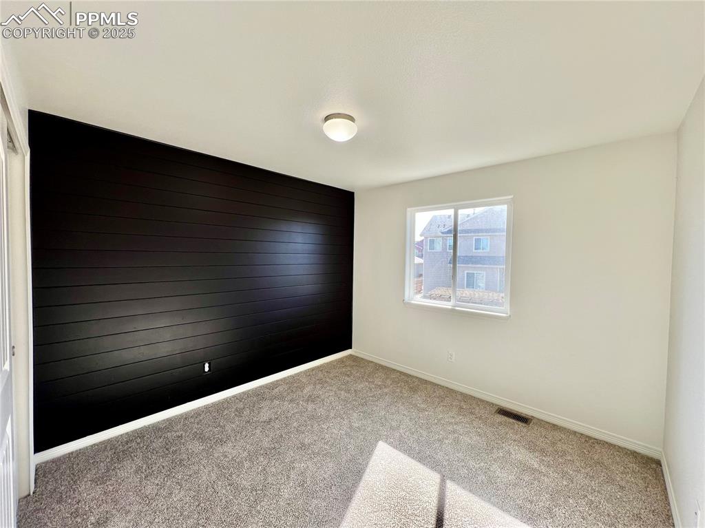 Image 21 of 45: Second Bedroom