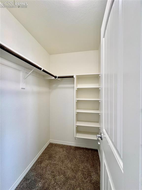 Image 25 of 45: Walk-in Closet