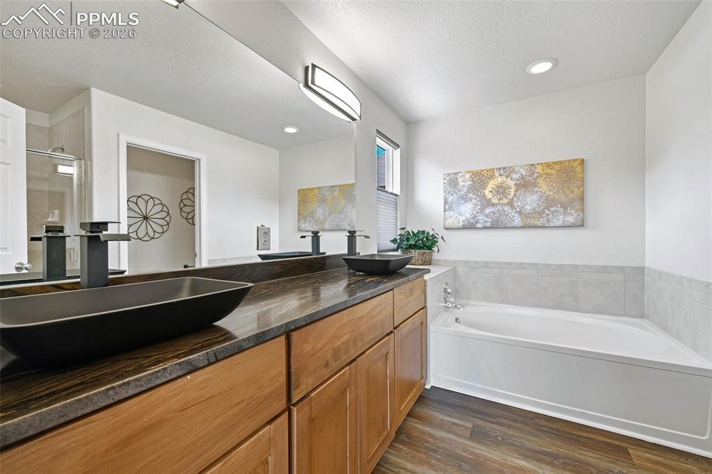 Image 24 of 48: updated counters sinks and fixtures as well as a soaking tub