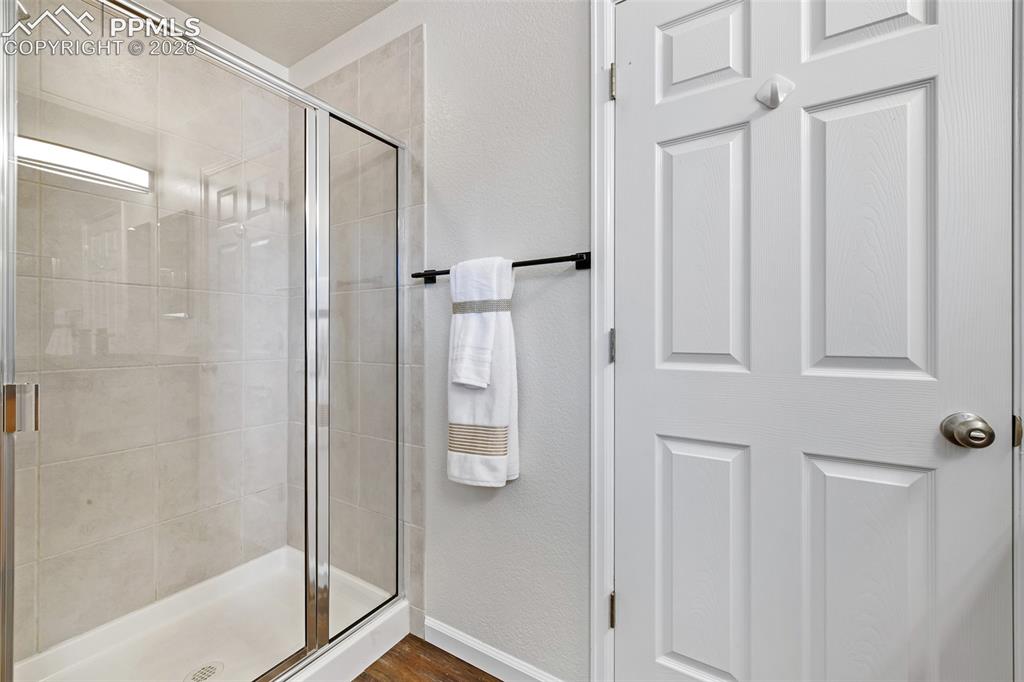 Image 25 of 48: and walk-in shower