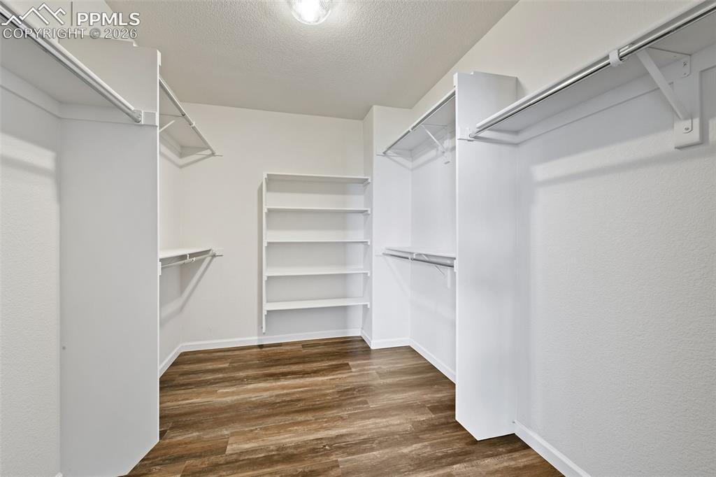 Image 26 of 48: closet complete with built-ins