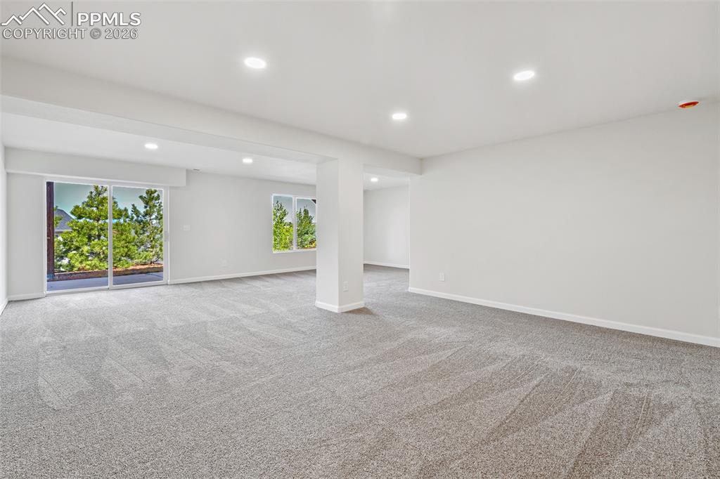 Image 30 of 48: Enormous walk-out family room