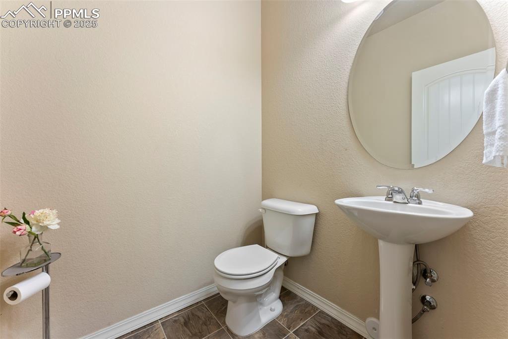Image 11 of 32: Powder room on the main floor