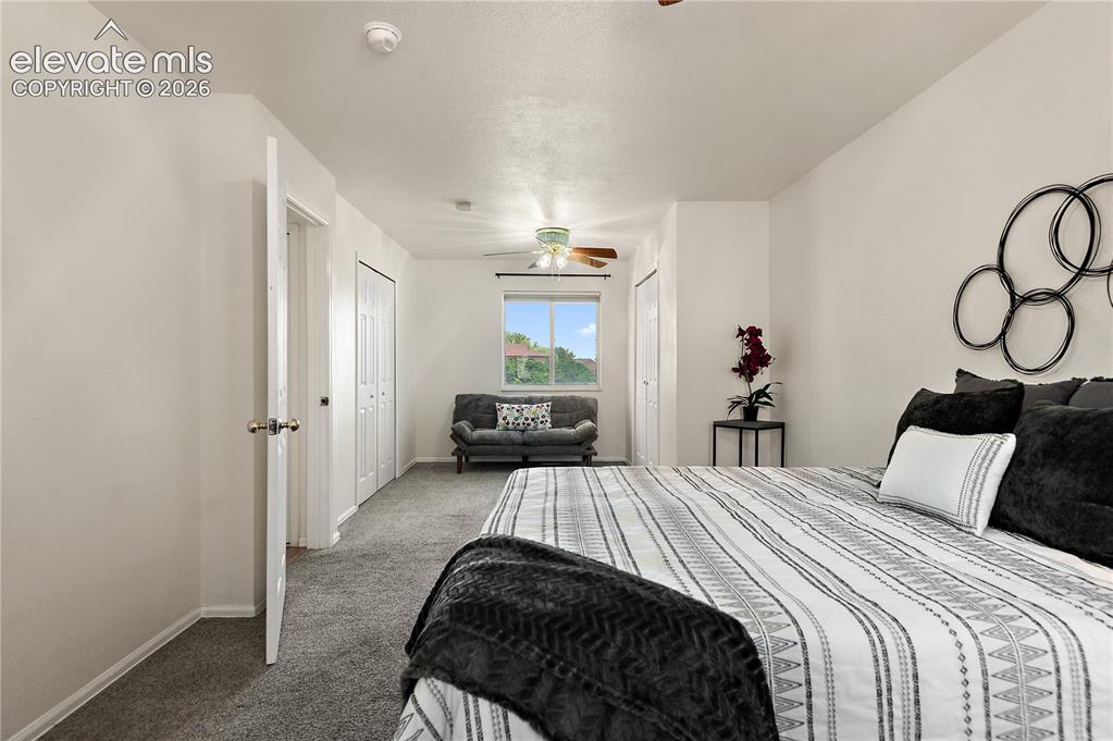 Image 12 of 31: Primary Bedroom with Sitting Room