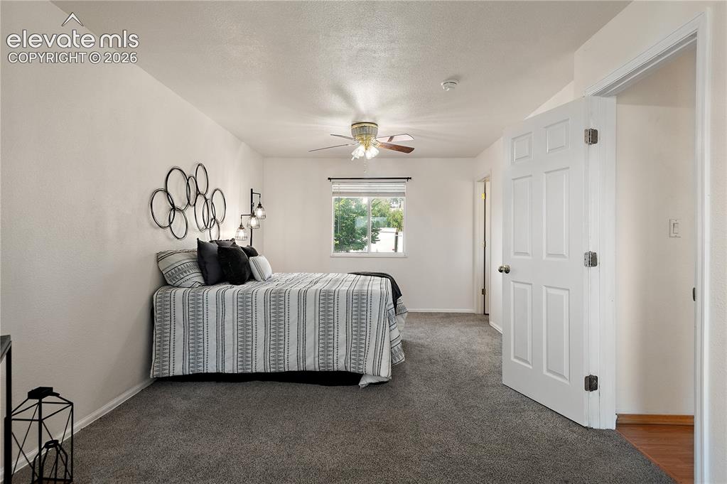Image 13 of 31: Primary Bedroom with Sitting Room