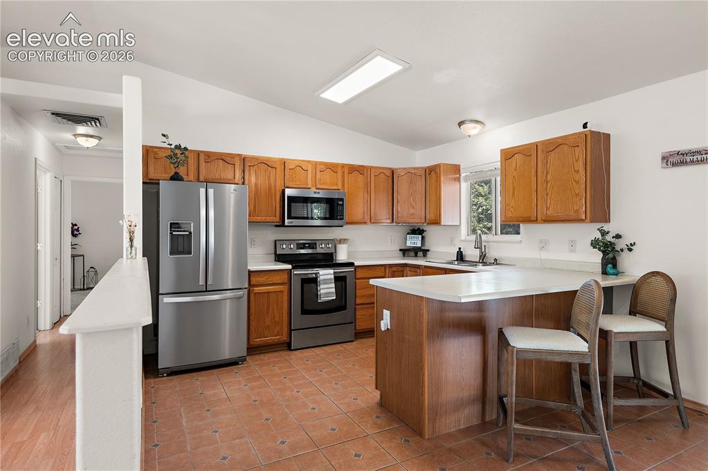 Image 2 of 31: Kitchen w/Stainless Appliances