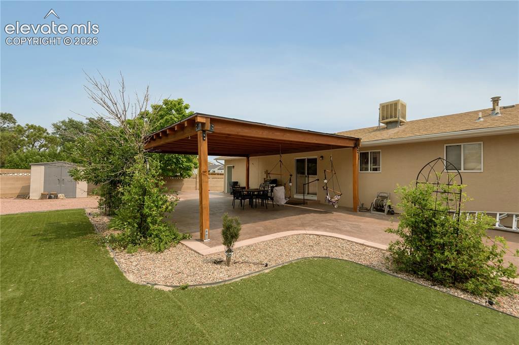 Image 3 of 31: Covered Back Patio