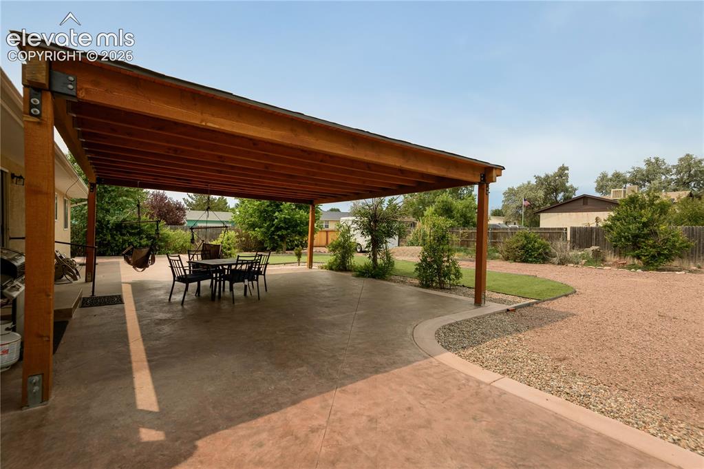 Image 5 of 31: Covered Back Patio