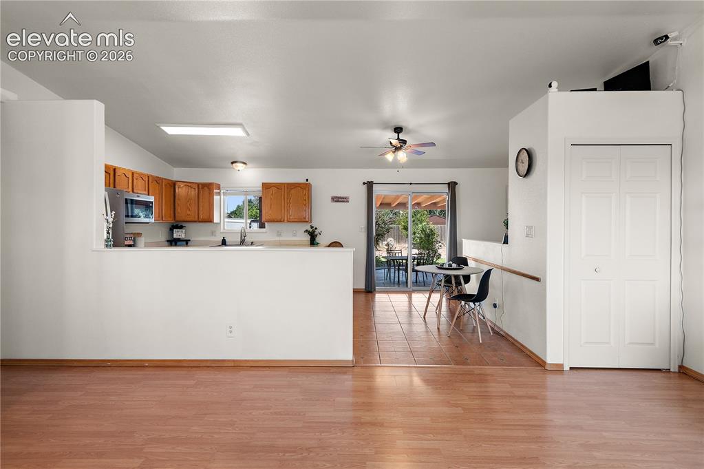 Image 8 of 31: Kitchen to Walkout Backyard