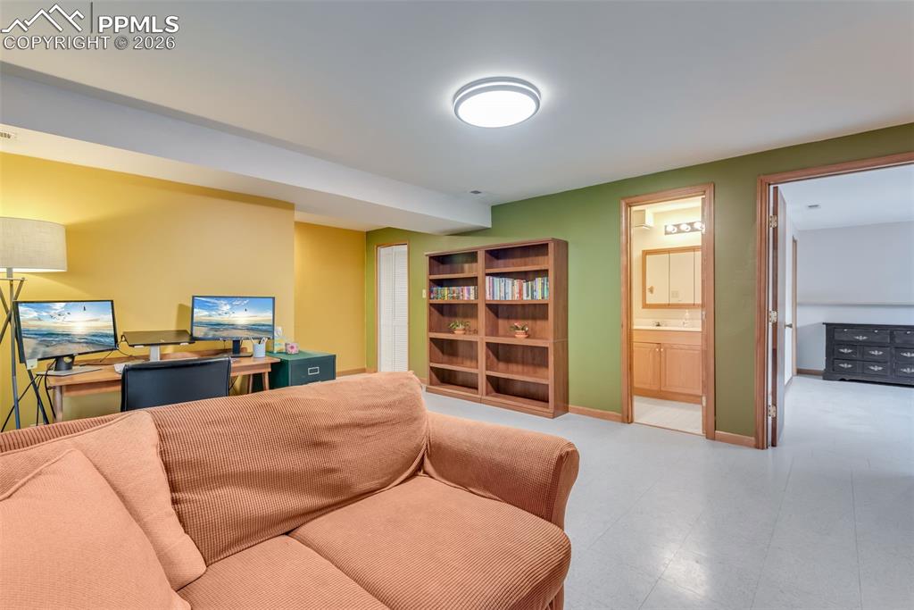 Image 29 of 34: Family room space in the basement which can be used in a number of ways --