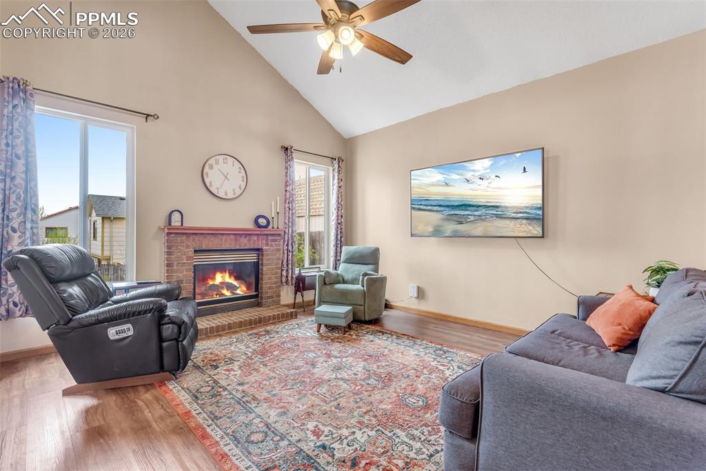 Image 9 of 34: Living room with fireplace