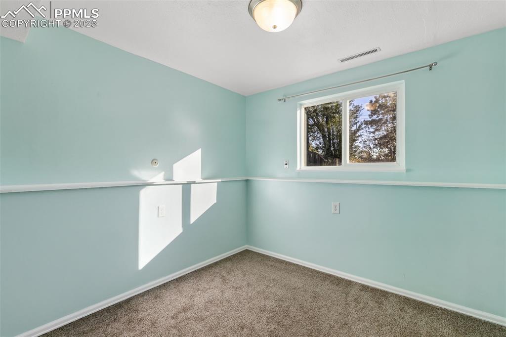 Image 18 of 25: Bedroom 3 lower level