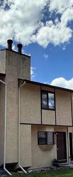 Image 2 of 21: Deck with an outdoor hangout area and a mountain view