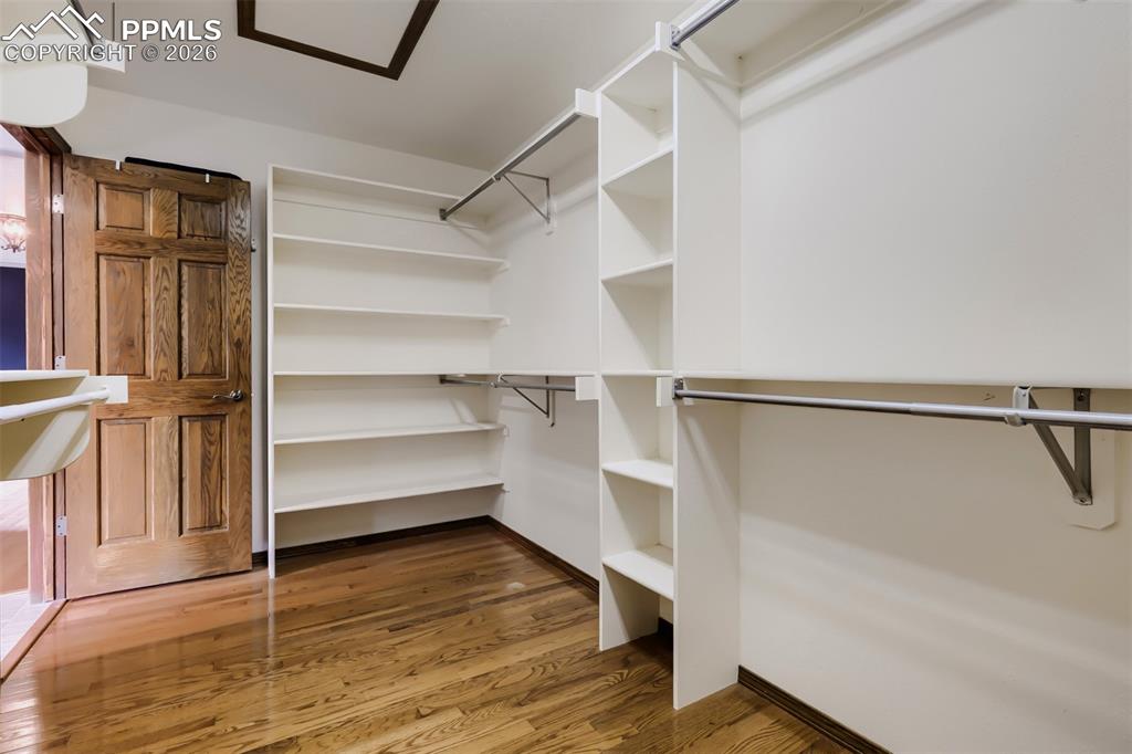 Image 27 of 48: Primary closet