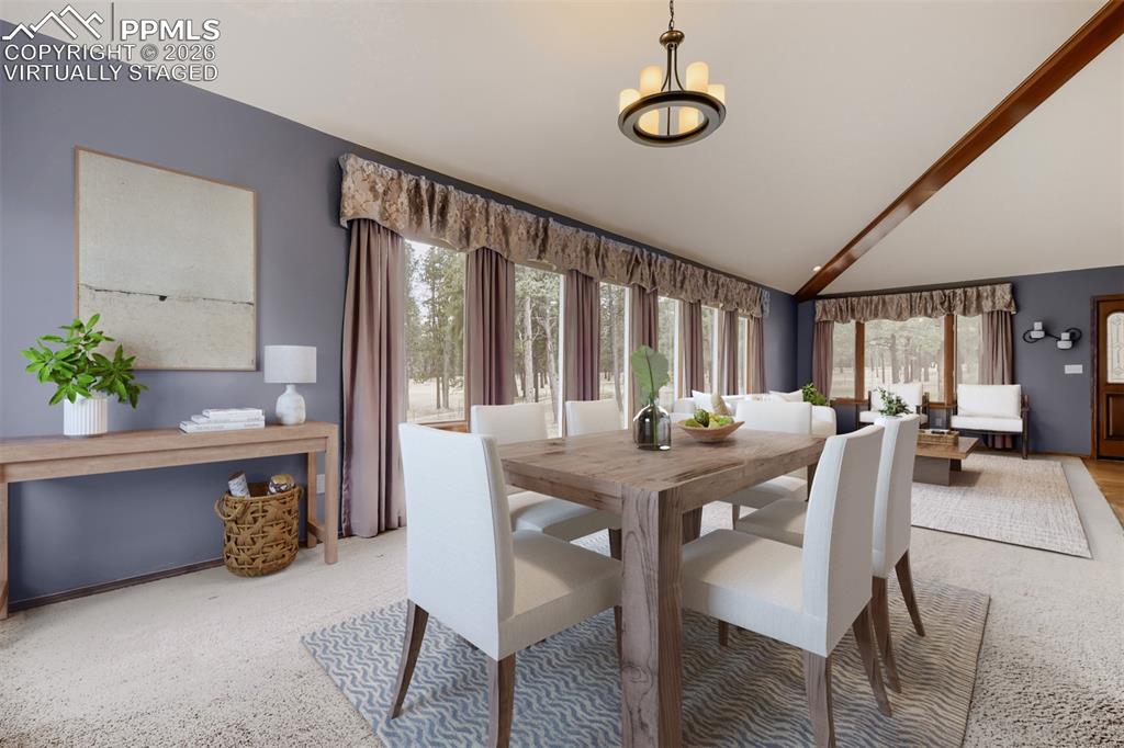 Image 9 of 48: Virtually staged formal living and dining rooms.