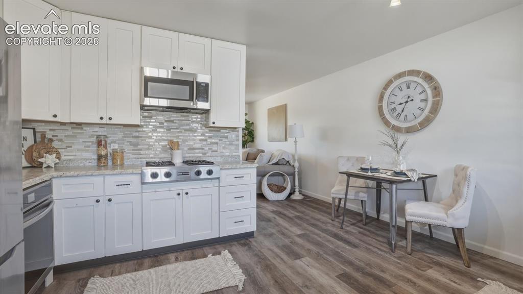 Image 21 of 48: Eat In Kitchen and Dining Area.