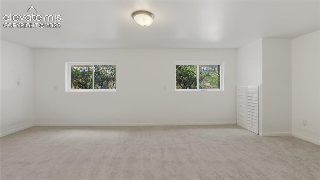 Image 28 of 48: Versatile Lower Level Family Room ideal for a media room, playroom, gym, or