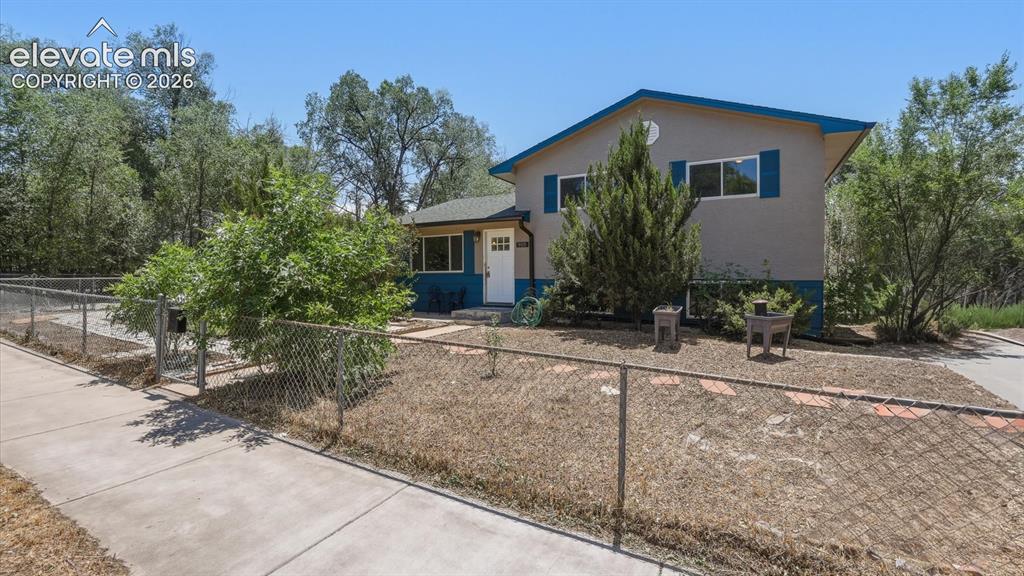 Image 5 of 48: Fully fenced xeriscaped lot.