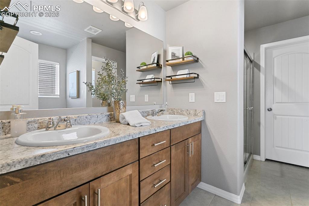 Image 28 of 47: Master Bath