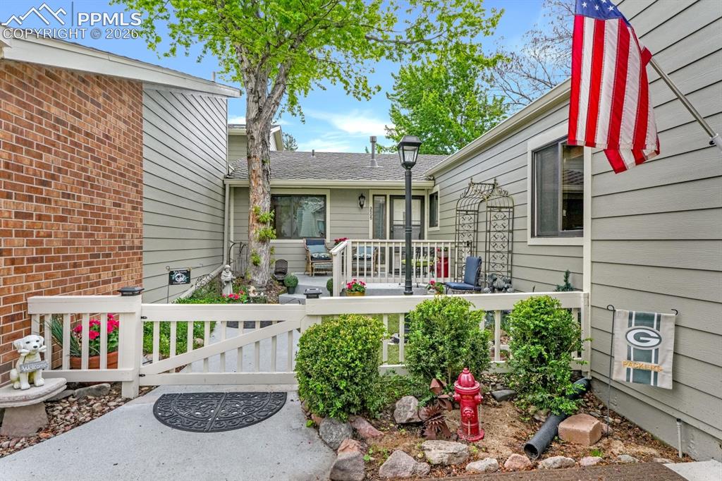 Image 2 of 42: Front of home, partially fenced