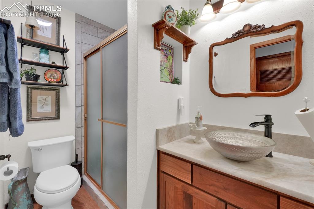 Image 22 of 42: 3/4 bathroom 