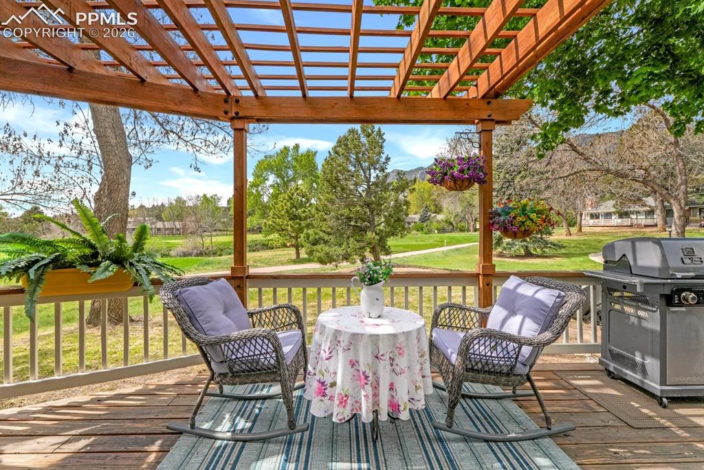 Image 28 of 42: Deck with pergola
