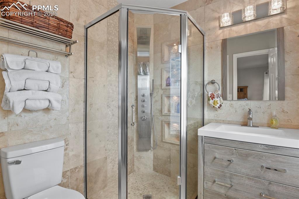 Image 15 of 31: Stylish Primary bathroom