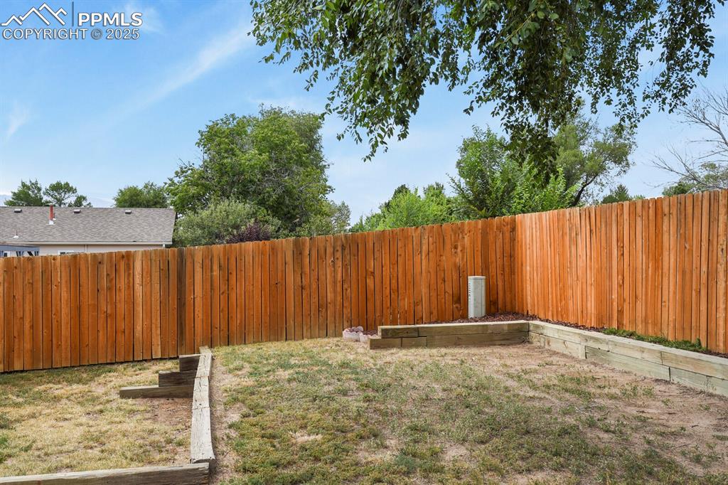 Image 27 of 31: Backyard with mountain views