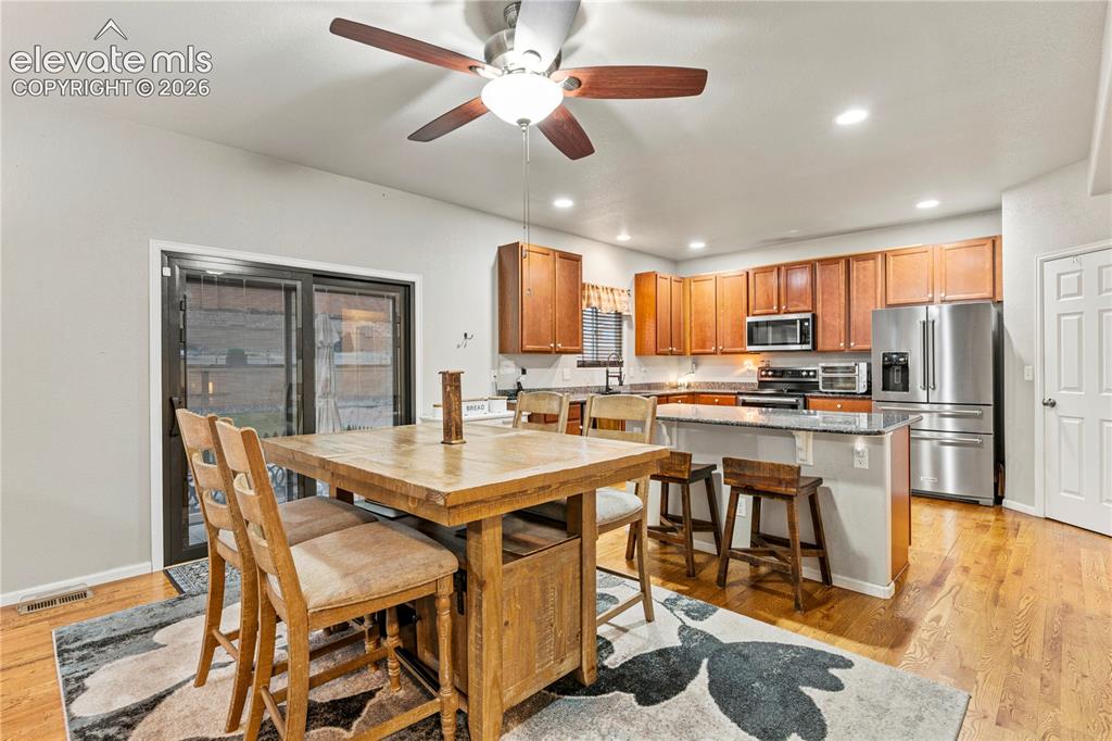 Image 10 of 43: Dining area walks out to back yard