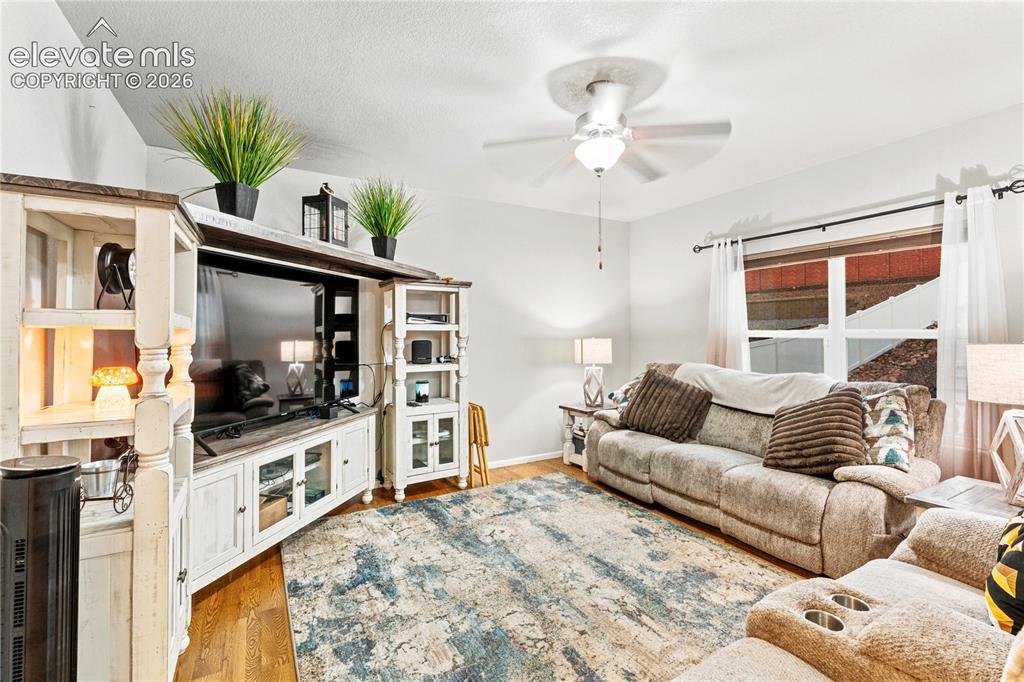 Image 15 of 43: Hardwood flooring throughout the main level