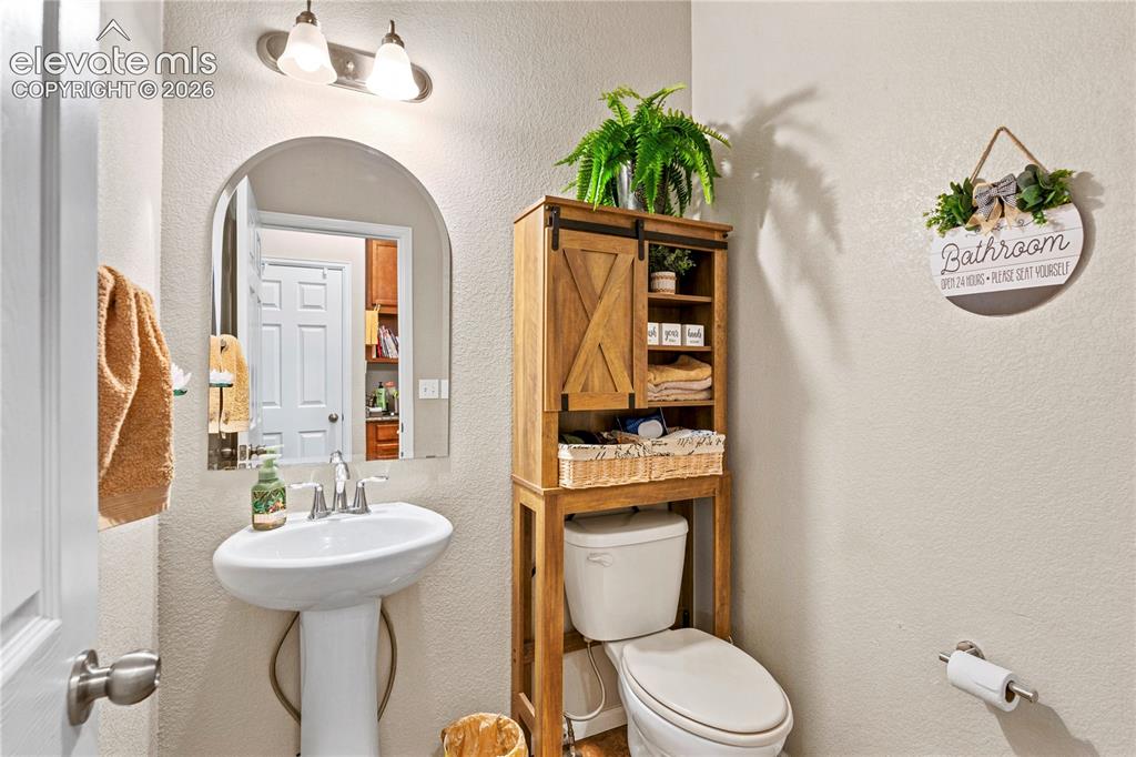 Image 16 of 43: 1/2 bath on main level