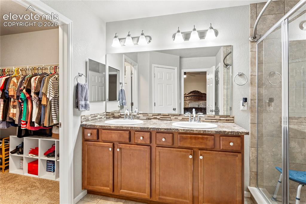 Image 19 of 43: 3/4 primary bathroom
