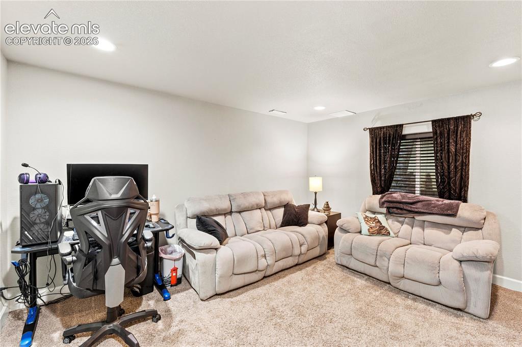 Image 25 of 43: Family room in basement