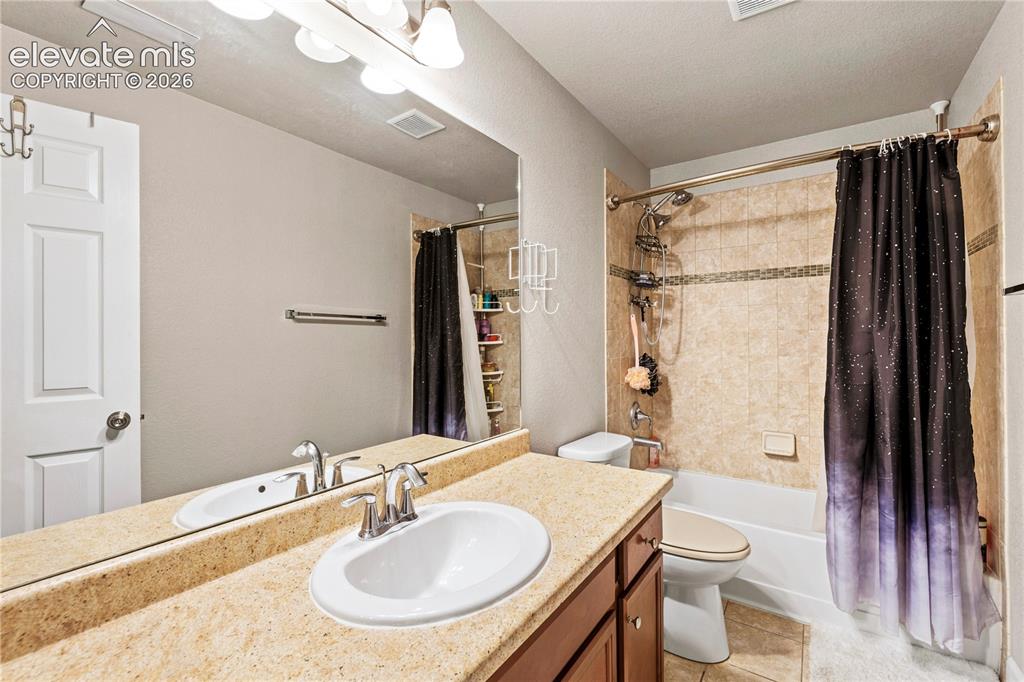 Image 27 of 43: Full bathroom in basement