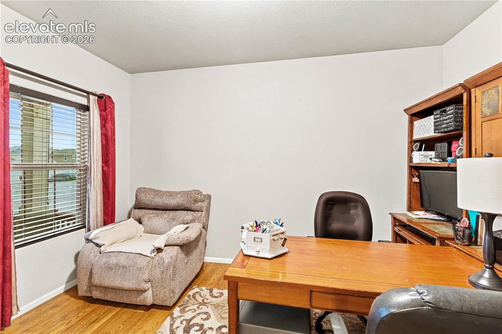 Image 6 of 43: Office is on the mail level as you enter the home.
