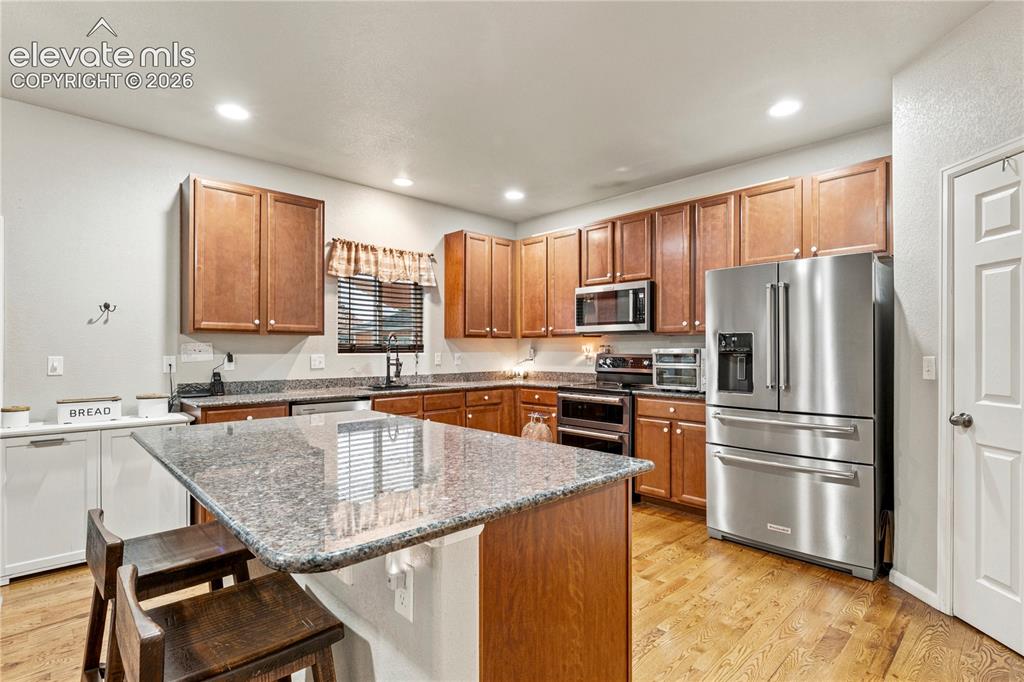 Image 7 of 43: Large pantry in kitchen