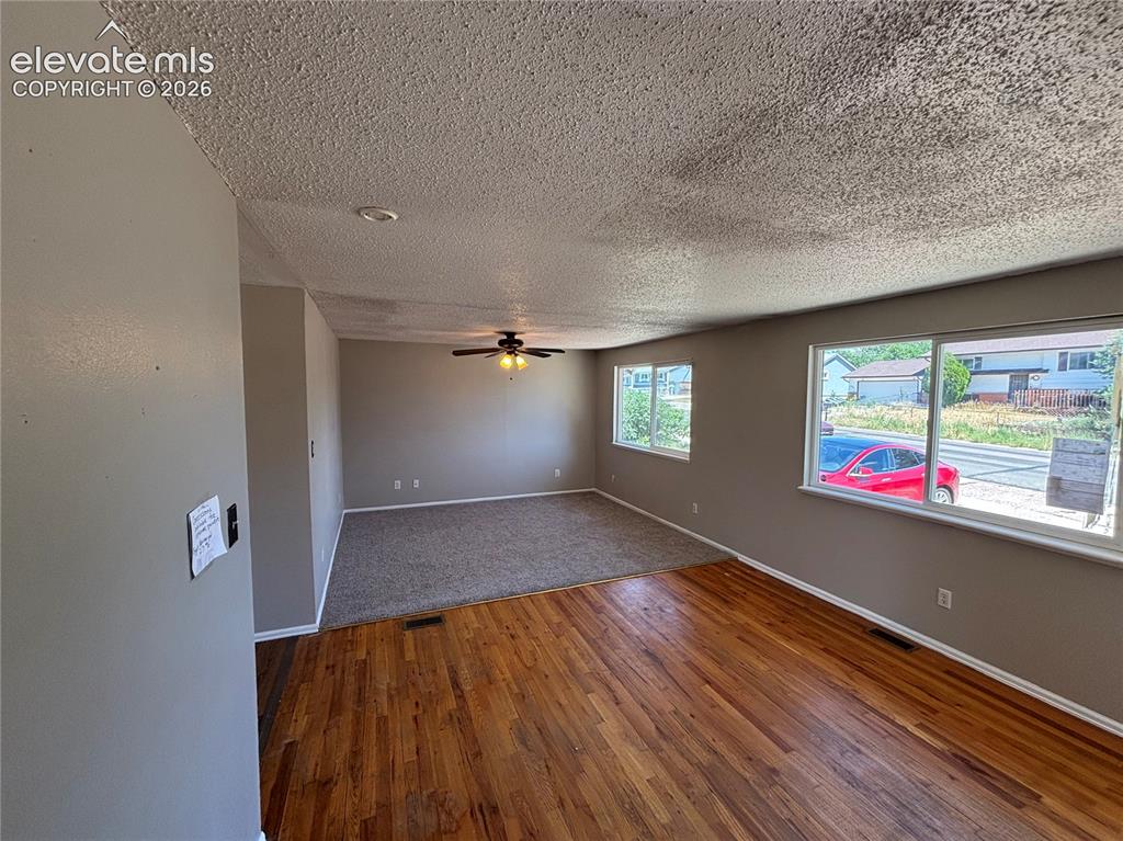Image 13 of 21: Dining Room and Living Room
