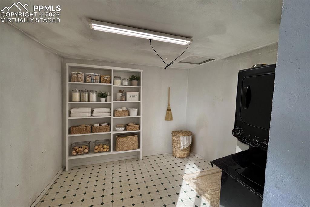 Image 14 of 27: Virtually Staged Pantry / Laundry