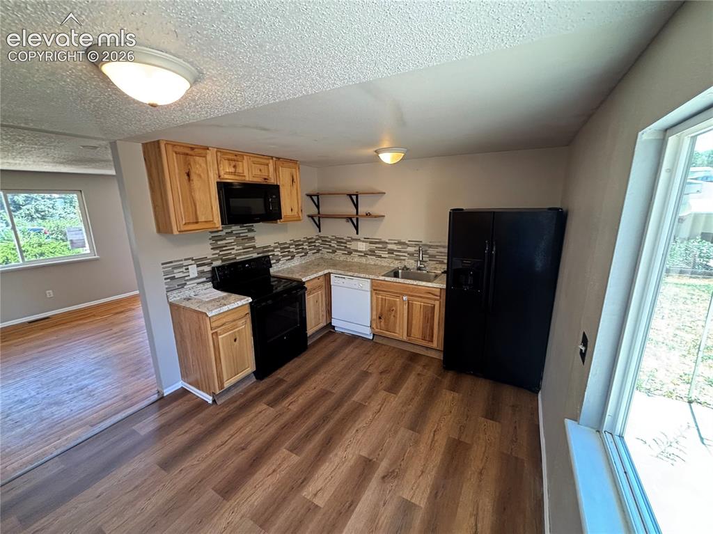 Image 3 of 21: Kitchen looking towards Dining Room