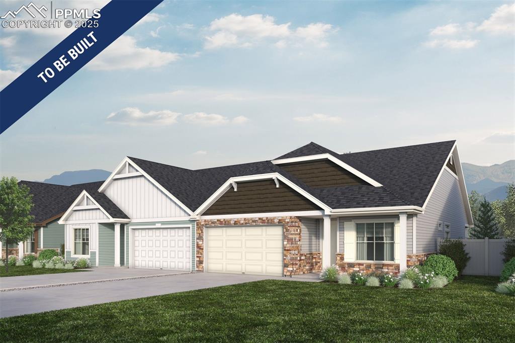 Caption: Craftsman-style house with concrete driveway, a front lawn, fence, a mountain view, and a garage
