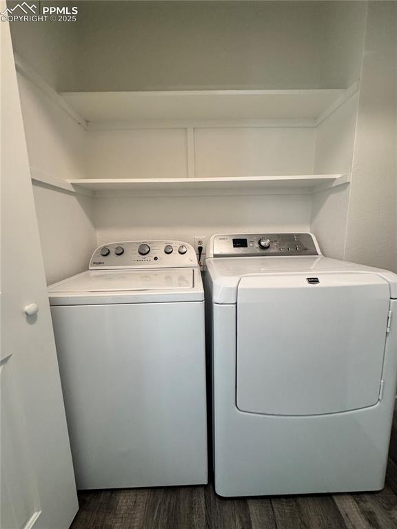 Image 24 of 24: Laundry closet with washer and clothes dryer