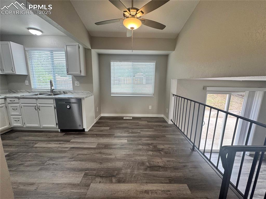 Image 9 of 24: Dining area with ceiling fan