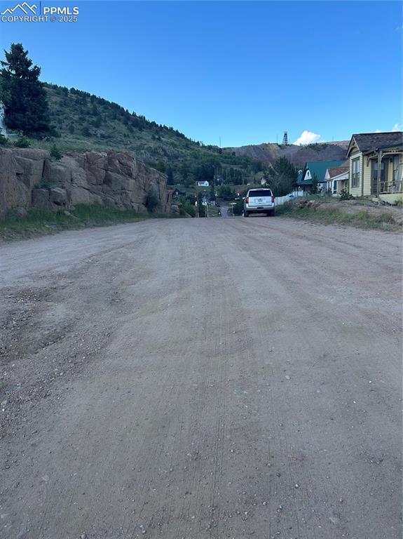 Image 6 of 6: View of street with a mountain view